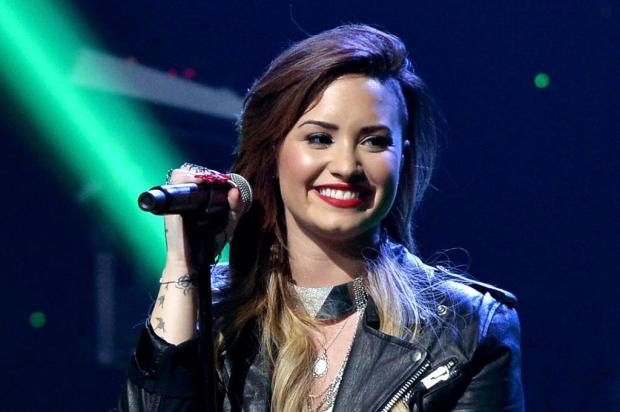 "Eu não sou tão fã do One Direction", diz Demi Lovato ao afirmar que não faria parceria com o grupo Kevin Winter/Getty Images for Clear Channel/AFP